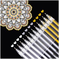 six pens with hearts on the side and one pen has an image of a flower