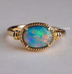 Gemstone  Natural Ethiopian opal Stone shape  Oval Band colors  Silver/ Gold /Rose gold  Silver purity  925 sterling  Style  Art Deco Ring For  Girls / Women Ring size  All Available  Our Business Policy   Shipping Time & Delivery Time:    Orders will be shipped between 4 to 7 days   Payment Terms :  We Accept Payment Through PayPal ONLY.   Return Policy:  *       You May Return Your Order Within 7 Days From The Date of Delivery. *       The Item Must be Returned In Its Original Condition. * Classic Ethiopian Opal Gemstone Rings, Elegant Oval Pink Opal Ring, Opal Rings With Gemstone Accents, Fine Jewelry Opal Oval Cabochon Ring, Fine Jewelry Opal Ring Oval Cabochon Birthstone, Oval Ethiopian Opal Birthstone Ring, Ethiopian Opal Birthstone Rings, Fine Jewelry Opal Rings With Gemstone Accents, Fine Jewelry Rings With Ethiopian Opal Birthstone