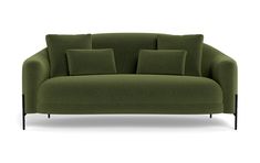 a green couch sitting on top of a white floor