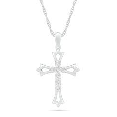 Display your faith with this elegant diamond cross pendant. Created in sterling silver, this design showcases petite diamonds - each artfully set to enhance size and sparkle - arranged in a cross shape. The open-worked flared edges gleam with floral details. Captivating with 1/20 ct. t.w. of diamonds and a bright polished shine, this pendant suspends along an 18.0-inch rope chain that secures with a spring-ring clasp. Sterling Silver Diamond Cut Cross Pendant Necklace, Sterling Silver Diamond Cut Cross Necklace, Sterling Silver Cross Necklace With Diamond Cut, Anniversary Diamond Cross Pendant Necklace, Diamond White Cross Necklace With Diamond Accents, Sterling Silver Cross Diamond Necklace With Diamond Cut, Sterling Silver Cross Diamond Necklace, Diamond White Cross Pendant Necklace For Anniversary, Diamond White Cross Necklace For Anniversary