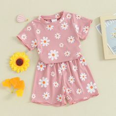 Dress your little one in style this summer with our SUMMER FLOWER Outfit! Featuring adorable floral prints and available in three vibrant colors, this cute set is perfect for warm days. Give your baby girl a fashionable look while keeping her comfy and cool! Sweet White Sets For Spring, Sweet White Spring Sets, Playful Short Sleeve Sets For Spring, Printed Playwear Sets For Spring, Playful Short Sleeve Spring Sets, Vacation Cotton Floral Print Sets, Cotton Floral Print Vacation Sets, Summer Short Sleeve Printed Sets, Sweet Sets For Spring Playtime