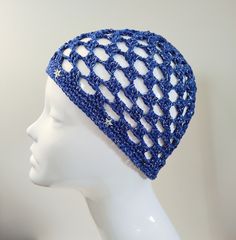 Inspired by the glam and Abba-esque styles of the 1970's, this bright blue and silver crochet skull cap will put you in the party mood. If you're planning a night out, or going off to a festival or concert, this skull cap adds a boho disco touch to your outfit. Hand crafted with high quality, fine cotton yarn, this chequered/ granny square effect mesh skull cap has a metallic silver thread running through the design. The edge is decorated with silver star sequins for extra glitter and sparkle. I Crochet Skull Cap, Star Sequins, Mesh Crochet, Crochet Skull, Skull Cap Beanie, Organza Gift Bags, Skull Cap, Silver Stars, Abba