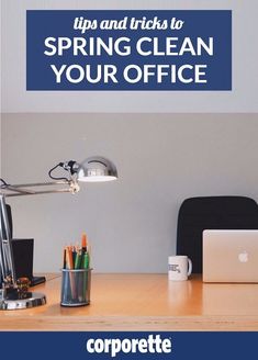 an office desk with a laptop computer on it and the words tips and tricks to spring clean your office