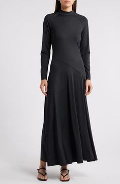 Asymmetric seams lend modern style to this versatile maxi dress boasting sumptuous stretch for event-ready comfort. 54 1/2" length (size Medium) Back keyhole with button-and-loop closure Mock neck Long sleeves Unlined 87% nylon, 13% spandex Dry clean Imported Fitted Maxi Dress With Asymmetrical Hem For Work, Elegant Maxi Dress With Side Slits And Asymmetrical Hem, Sleek Stretch Maxi Dress With Side Slits, Formal Stretch Maxi Dress With Bias Cut, Formal Maxi Dress With Asymmetrical Hem And Side Slits, Formal Maxi Dress With Side Slits And Asymmetrical Hem, Sleek Stretch Maxi Dress With Flattering Silhouette, Elegant Stretch Maxi Dress With Bias Cut, Elegant Stretch Bias Cut Maxi Dress