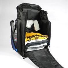 The Top Hopper Backpack is the best and largest sports backpack on the market today specifically designed for today's athlete.  Many athletes are large individuals and require a larger backpack.  Most competitor backpacks can fit inside this backpack.   Size:  21"x15"x9 Design Features: XL design to carry a full-size b Sports Backpacks, Disc Golf Bag, Vinyl Shop, Sports Backpack, Orange Backpacks, Travel Team, Taper Design, Personal Belongings, Backpack Travel