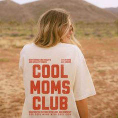 Get ready to be OBSESSED with your new Cool Moms Club shirt. It's the cutest and most trendy way to emit all those important trendy mom vibes! This is the perfect tshirt!  FRONT AND BACK DESIGN! * Q U I C K * F A C T S * ✺  All shirts are UNISEX ✺  100% Airlume combed and ringspun cotton (fiber content may vary for different colors) ✺ Wash and dry normally (on cool for best results) * S I Z I N G * ✺ For an oversized fit, select two or three sizes up from your normal size ✺ Model is wearing size L  ✺ Sizing runs true to size ✺ Most women find their typical size works best, since they are meant to fit a touch loose ✺ Runs a little small for men so please size up for the best fit ✺ See Size guide and fit in images          * S H I P P I N G * T I M E S * ✺ Our items are individually made wit Mom To Be Shirt, Moms Club Shirts, Cool Moms Club Shirt, Event T Shirt Design, T Shirt Ideas For Women, Cool Mom Aesthetic, Bonus Mom Shirt, Cute Mom Shirts, Cool Mom Shirts