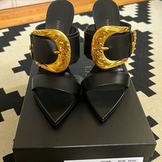 New In Box. Half Size Too Big For Me I Never Wore Them I Decide To Let Go I Wear Us7 37.5 In Versace Black Luxury Mules With Sculpted Heel, Luxury Black Mules With Sculpted Heel, Luxury Closed Toe Mules With 4-inch Heel, Luxury Black Mules With Buckle Closure, Luxury 4-inch Heel Closed Toe Mules, Luxury Formal Mules With Buckle Closure, Designer High Heel Mules With Buckle Closure, Designer Mules With Buckle Closure For Formal Occasions, Designer Formal Mules With Buckle Closure