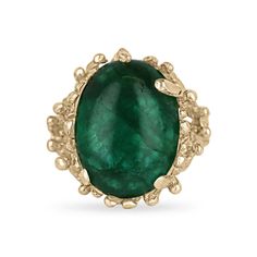 Embrace the unique allure of nature with our Solitaire Cabochon Cut Gold Nugget Ring. Featuring a mesmerizing 12-carat oval cabochon cut emerald with a deep green hue and translucent clarity, this piece captures the essence of earth's beauty. Set vertically in a distinctive gold nugget/ruffle styled prong setting crafted from 14k yellow gold, this ring merges organic elegance with luxurious craftsmanship, creating a statement piece that exudes both sophistication and raw natural charm. Setting Style: Prong-Solitaire Setting Material: 14K Yellow Gold Setting Weight: 7.0 Grams Main Stone: Emerald Cut: Cabochon Shape: Oval Weight: 12-Carats Clarity: Translucent  Color: Dark Green Luster: Very Good Treatments: Natural, Oiling Origin: Zambia Estimated Retail Value: $9,700.00 USD A certificate o Luxury Hallmarked Oval Cabochon Emerald Ring, Luxury Modern Emerald Ring With Oval Cabochon, Luxury Polished Emerald Ring, Oval Cabochon, Luxury Oval Cabochon Jewelry With Prong Setting, Luxury Green Oval Cabochon Emerald Ring, Luxury Elegant Emerald Ring Oval Cabochon, Luxury Oval Cabochon Emerald Ring With Prong Setting, Luxury Gold Oval Cabochon Emerald Ring, Luxury Emerald Ring Oval Cabochon