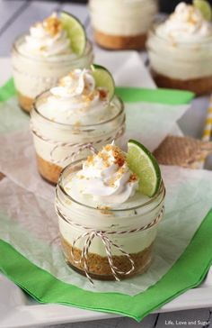 small desserts with lime and whipped cream in glass jars