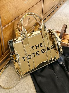 Material: PU Leather Single Shoulder Strap Shiny Finish S: 7.1“L x 3.1"W x 5.5"H L:13“L x 3.9"W x 9.8"H Crossbody Style Tote Bag Minimalist Design M:10.2“L x 3.1"W x 7.5"H Trendy Gold Satchel With Zipper Closure, Gold Tote Satchel With Zipper Closure, Gold Rectangular Shoulder Bag With Zipper Closure, Gold Box Bag With Large Capacity For Shopping, Gold Rectangular Shoulder Bag With Zipper, Trendy Gold Shoulder Bag With Double Handle, Trendy Large Capacity Gold Satchel, Gold Large Capacity Crossbody Box Bag, Gold Tote Box Bag With Large Capacity