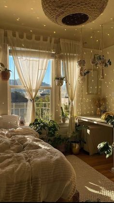 a bedroom with lights on the ceiling and curtains