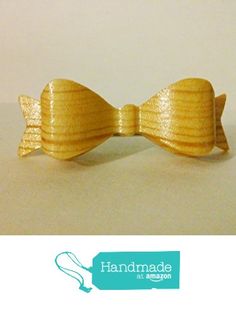 a close up of a wooden bow tie