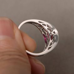 This is a gorgeous handmade creation. Its beauty is its simplicity & Elegance. The 7*7mm round shape faceted lab ruby is crafted in solid sterling silver and with rhodium plated. All item is sent in a beautiful gift box If you have any idea of design your ring,pls contact me directly. You can realize more lovely stuff clicking the link https://www.etsy.com/shop/knightjewelry?refshopsection_shophome_leftnav Please leave the correct address and you phone number for delivering successfully. Elegant White Gold Ruby Ring, Lab-created Ruby Diamond Ring With Prong Setting, Elegant Red Dome Ring For Anniversary, Formal Ruby Ring With Cubic Zirconia In Round Band, Formal Cubic Zirconia Ruby Ring With Round Band, Formal Cubic Zirconia Ruby Ring, Ruby Open Ring With Prong Setting, Elegant Sterling Silver Ruby Open Ring, Elegant Ruby Promise Ring With Round Stone