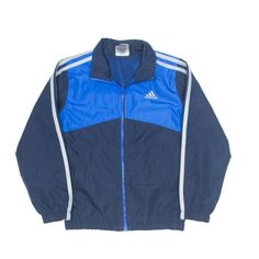 ADIDAS Mesh Lined Track Jacket Blue Colourblock Boys 5 Years Blue Nylon Track Jacket For Sports, Blue Color Block Track Jacket For Streetwear, Blue Adidas Logo Outerwear For Winter, Blue Color Block Track Jacket, Blue Adidas Logo Winter Outerwear, Blue Adidas Winter Outerwear, Vintage Blue Nylon Track Jacket, Winter Blue Adidas Outerwear, Blue Athleisure Track Jacket With Color Block