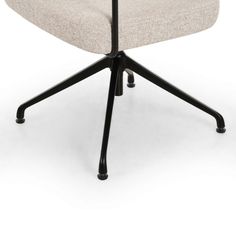 an office chair with black legs and a beige upholstered seat, viewed from the front