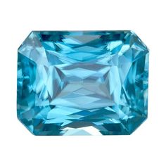 an aqua colored diamond on a white background