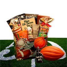 a football themed gift basket with sports items