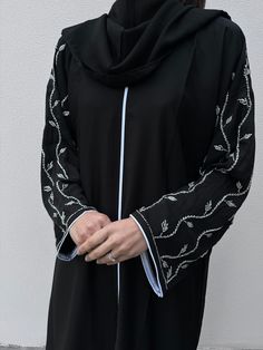 Elegant Long Abaya With Dabka Work, Eid Thobe With Intricate Embroidery Long Sleeve, Long Sleeve Thobe With Intricate Embroidery For Eid, Eid Thobe With Intricate Embroidery, Formal Abaya With Dabka Work For Eid, Formal Eid Abaya With Dabka Work, Elegant Long Sleeve Thobe With Dabka Embroidery, Elegant Long Sleeve Thobe With Dabka, Elegant Long Sleeve Abaya With Intricate Embroidery