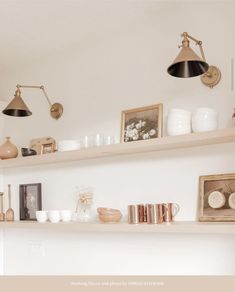 the shelves are filled with vases, bowls and other items on them in this room