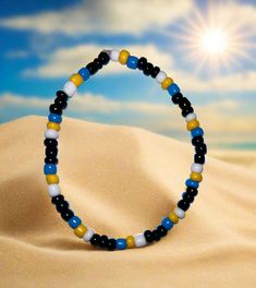 Represent your Island in style with our St Lucia Beaded Bracelet Available in: -Jamaica  -Trinidad and Tobago -St Vincent & Grenadines   -Grenada  -Rastafarian  Available in 6 sizes Tiny 5 - 5.5 inches  XS 6 - 6.5 inches  S 6.5 - 7 inches  M 7 - 7.5 inches  L 7.5 - 8 inches  XL 8 - 8.5 inches Materials: Glass seed beads (4mm) Includes a free jewellery bag to keep your bracelet safe. St Lucia, Trinidad, Jewelry Bags, Jamaica, Trinidad And Tobago, Free Jewelry, Seed Beads, Beaded Bracelets