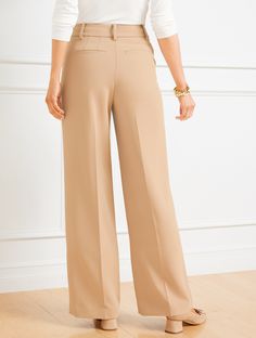 Introducing the Talbots Weston Pant. Featuring a flattering high waist and chic wide leg. Beautifully tailored with of-the-moment pleats–for a fresh, modern, irresistible fit. Timeless stretch crepe fabric looks great any day of the week. Features Pleat Front/Trouser Wide Leg Hits High Waist Full Length Fly front with hook & bar closure Front Slash, Back welt pockets Imported Fit: Misses: 31"; Petite: 28 1/2"; Plus: 31"; Plus Petite: 28 1/2" Material: 91% Polyester, 9% Spandex Care: Machine Wash Versatile Wide Leg Formal Pants, Chic Wide-leg Pants With Welt Pockets, Formal Wide Leg Versatile Pants, Chic Wide Leg Dress Pants For Business Casual, Tailored Wide Leg Versatile Pants, Versatile Formal Full Length Wide Leg Pants, Chic Full Length Business Casual Dress Pants, Tailored Wide-leg Bottoms For Business Casual, Business Casual Wide Leg Pants With Pressed Crease