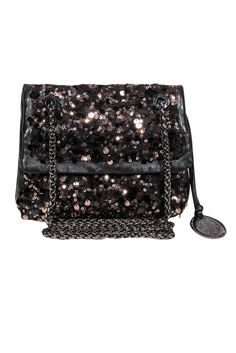 Shower yourself in sequins with this crossbody from Elie Tahari! This chic bag features brown sequins that will go perfect with your going out outfit! Pair with a little black dress and shiny heels for a sultry look. Smooth leather texture Front flap and snap hinge closure Silver-toned hardware Chain strap One interior slip pocket All-over brown sequin detail Dustbag included Width 7" Height 5.5" Depth 4" Strap drop 24" Shiny Heels, Going Out Outfit, Chic Bags, Elie Tahari, Leather Texture, Going Out Outfits, Chain Strap, Smooth Leather, Leather Crossbody