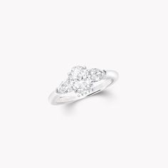 Designed to accentuate the unique beauty and entrancing brilliance of the centre stone, a remarkable oval cut diamond is embraced by perfectly matched pear shape side stones in our Promise engagement ring in platinum. Available in a variety of different carat sizes, a member of the Graff family personally selects each stone in our bridal collection to ensure exceptional quality and perfect provenance, while each bespoke setting is shaped by our master craftsmen to cradle the unique silhouette of Graff Engagement Ring, Pink Diamond Engagement Ring, Graff Diamonds, Yellow Diamonds Engagement, Bridal Jewels, Pear Diamond Engagement Ring, Pink Engagement Ring, Yellow Diamond Engagement Ring, Emerald Cut Diamond Engagement