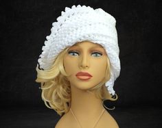 "**Crochet a 1920s Flapper Hat with a Twist by Strawberrycouture **Finished Measurements - Size: 18 inches (46 cm) around, 9 inches (23 cm) long **Yarn Used - Recommended: Worsted weight acrylic yarn (233-280 meters) **Hooks and Other Materials - Crochet hooks in sizes N (9 mm) and 10 1/2 (6.5 mm) - Scissors - Tapestry needle **Important Note This listing is for the purchase of the pattern ONLY, not the actual finished item. You will receive a digital download of instructions on how to make your White Crochet Hat With Short Brim For Winter, White Wide Brim Crochet Hat For Winter, Winter White Wide Brim Crochet Hat, White Crochet Winter Hat One Size, White Crochet Hat For Winter, One Size, White Crochet Winter Hat, One Size, White Brimmed Warm Hat, White Warm Brimmed Hat, White Crochet Hat, One Size Fits All