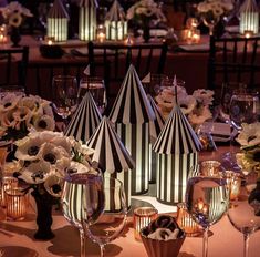 an image of a table setting with flowers and candles