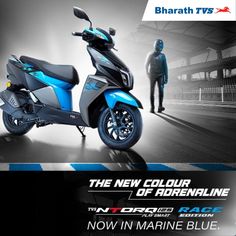 the new scooter is available in blue and silver colors, with an image of a man standing next to it