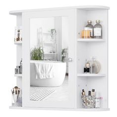 a white bathroom with shelves and a bathtub