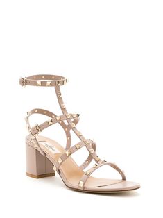 Beige leather Rockstud strappy sandals from VALENTINO GARAVANI featuring gold-tone Rockstud embellishment, buckle-fastening ankle strap and mid block heel. Caged Sandals, Stylish Sandals, Valentino Rockstud, Comfortable Heels, Studded Leather, Spring Shoes, Designer Heels, Ankle Straps, Dolce & Gabbana