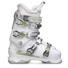 a pair of white ski boots sitting on top of each other