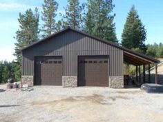 two garages are shown in front of some trees