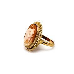 Show your Aries pride with this fun ring from the 1970s! The imitation cameo is set into the gold-toned metal and depicts a detailed ram's head framed by ARIES MAR21-APR 19. The pink cameo is framed with ropework and would make a lovely vintage costume piece to add to your collection!The ring is in very good vintage condition with minimal signs of wear. The surface of the gold-toned metal has fine lines and marks, nothing noticeable or distracting. The cameo doesn't wiggle in the setting and is Aries Ring, Aries Ram, Zodiac Aries, Cameo Ring, Aries Zodiac, Rings Cool, Pinky Ring, Ring Size 7, Vintage Costumes