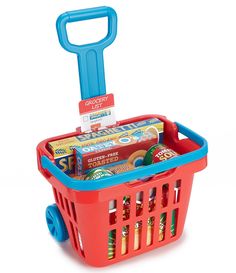 a red shopping basket filled with snacks and candy