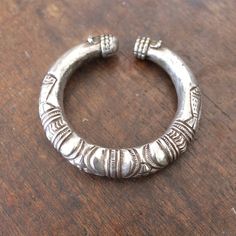 Vintage hallow coin silver Taru people of Himalayas cuff bracelet one of kind jewelry.Inner width; 62mmHeight ; 17mm Silver Spiritual Bangle For Festivals, Artisan Silver Cuff Bracelet For Festival, Traditional Nickel-free Silver Cuff Bracelet, Unique Silver Bracelets For Festivals, Unique Silver Bracelet For Festivals, Artisan Silver Round Cuff Bracelet, Artisan Silver Bangle, Artisan Silver Round Bangle, Unique Hand Cast Silver Bangle