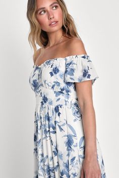 We can't help but dream about all the picnics and brunches we'll attend wearing the Lulus Delightfully Sweet White Floral Off-the-Shoulder Midi Dress! A whimsical floral print decorates gauzy woven fabric as it shapes this perfect sunny day dress, that features a lightly gathered bodice and a ruffle-trimmed, off-the-shoulder neckline, framed by fluttery short sleeves. The set-in waist (with long tying sash that secure at the back) tops a flowy, A-line midi skirt that falls to a tiered hem. Hidde Flowy Floral Print Off-shoulder Dress, White Off-shoulder Maxi Dress With Floral Print, White Off-shoulder Midi Dress With Floral Print, Feminine Off-shoulder Floral Print Dress, Blue Floral Print Maternity Dress, Cute Floral Dresses, White Floral Print Dress, Gathered Bodice, Printed Gowns