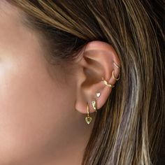 These earrings feature shimmering hearts polished to a high shine, elegantly dangling from classic hoops. Perfect for adding a touch of romance to any look.Gold Vermeil Height 20mm(0.8in) x Width 6.5mm(0.25in) Inside diameter: 9mm #E458-G Knots Jewelry, Ear Stacks, Jewelry Gift Guide, Gold Heart Earring, Moms Bracelet, Gold Ear Cuff, Choker Pendant, Gold Statement Ring, Studded Necklace