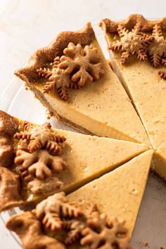 there is a pie on the plate with many pieces cut out and ready to be eaten