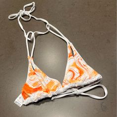 Mix And Match This Reversible Bikini Top From Venus. White On One Side And Orange Print On The Other Side Make This Top Easily Paired. Features A Tie Neck And Back, Triangle Style With Cut-Outs And Adjustable Gathered Bottom. Size: Xsmall New Without Tags. In Excellent Condition. From A Smoke Free Home. Orange Print, Reversible Bikinis, Cute Bikinis, Tie Neck, The Other Side, Mix And Match, Cut Outs, Womens Swim, Bathing Suits