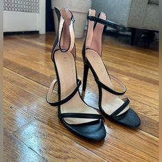 Never Worn Sleek Black Heels With Heel Loop, Black Heels Medium Width For Night Out, Black Heels With Heel Strap For Date Night, Black Medium Width Heels For Night Out, Sleek Black Heels With Heel Strap, Black Synthetic Heels For Date Night, Black Heels With Sculpted Heel For Date Night, Black Heels, Shoes Women Heels