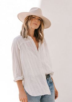 [Color: Ivory] A model wearing a sheer cotton oversize boyfriend shirt in an ivory yarn dye stripe. With a cross yoke detail in the back Front Tuck, Flattering Tops, Boyfriend Shirt, Long Tunic, A Cross, Tunic Length, Wrap Skirt, Yarn Dyeing