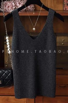 Stay cozy and stylish in this wool knitted vest with a V-neck design. Perfect for layering over camisoles or shirts, it adds a chic touch to your outfits. Details: Elasticity: High Stretch Fabric Type: Woolen Material: wool Size (IN) Bust Length M 31.50 21.26 L 33.07 21.65 XL 34.65 22.05 V-neck Sweater Vest For Fall, V-neck Knit Top For Winter Layering, Trendy Ribbed V-neck Sweater Vest, Ribbed V-neck Knit Top For Layering, Trendy V-neck Ribbed Sweater Vest, Chic Knit V-neck Vest, Knitted V-neck Tank Top For Winter, Knitted Tank Top For Fall, Chic Knitted V-neck Top