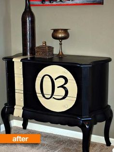 a black and white cabinet with the number thirty three painted on it's side