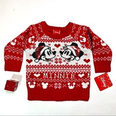 The Cutest Holiday Sweater For A Little Minnie Mouse Fan. Features A Mickey And Minnie Mouse Woven Pattern As Well As Both Characters With Bedazzled Santa Hats On The Chest. 100% Acrylic Playful Mickey Mouse Winter Tops, Playful Mickey Mouse Winter Top, Playful Mickey Mouse Top For Winter, Nightmare Before Christmas Sweater, Minnie Mouse Sweater, Minnie Mouse Red, Mickey Theme, Mickey Mouse And Minnie Mouse, Minnie Mouse Christmas