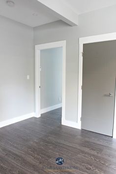 an empty room with white walls and wood floors is featured in the ad for this website