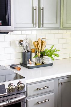 the kitchen counter is clean and ready to be used as a cooking utensil holder