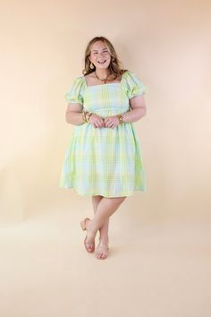 Introducing our Spring Serenity Dress, a vision of elegance and charm! Embrace its whimsical allure with balloon sleeves, a square neckline, and vibrant hues of green, blue, and yellow. Available in sizes small to 3XL, and fully lined for your comfort. Model: Abby is wearing a size large. Size Suggestions and Measurements: Small: 2-6 | Bust: 14 inches across the front | Length: 36 inches Medium: 8-10 | Bust: 14 inches across the front | Length: 37 inches Large: 12-14 | Bust: 15 inches across the Garden Party Puff Sleeve Dress With Square Neck, Green Fitted Puff Sleeve Dress For Garden Party, Fitted Green Puff Sleeve Dress For Garden Party, Green Puff Sleeve Dress For Garden Party, Green Dresses With Elastic Sleeves For Brunch, Green Fitted Dress With Balloon Sleeves, Casual Green Dresses With Balloon Sleeves, Green Square Neck Puff Sleeve Dress For Spring, Casual Green Puff Sleeve Dress With Smocked Bodice