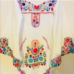 Mexican Dress Boho Mini Vintage Embroidered Hippie Long Bell Sleeves Mini Bodycon Cotton Organic Handmade Fairtrade Embroidery Unique Design From Aida Coronado One Of A Kind Rare Mexico Folk Art Short Version La Esperanza Design Magic Mexico Clothing Vintage Style Designer: Aida Coronado Embroidery: Indigenous Native Mexican Dresses Made With Love Aida Coronado Is A Fashion Designer Based In Mexico. She Is Known For Her Beautiful And Unique Designs That Incorporate Traditional Mexican Textiles A Traditional White Embroidered Dress, White Traditional Embroidered Dress, White Kaftan With Embroidered Border For Wedding, White Embroidered Border Kaftan For Wedding, White Folk Embroidered Wedding Dress, White Folk Style Embroidered Wedding Dress, Summer White Kaftan With Intricate Embroidery, White Embroidered Kaftan For Traditional Ceremonies, Traditional White Embroidered Summer Fabric